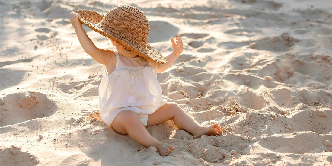 Baby in the sun on the beach