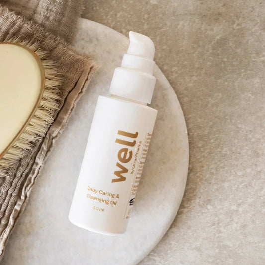 Well by Orion Pharma Baby Caring & Cleansing Oil. Vegan, fragrance-free, and colorant-free.