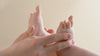 Cute close up of baby, a pregnant woman and self-care routines.